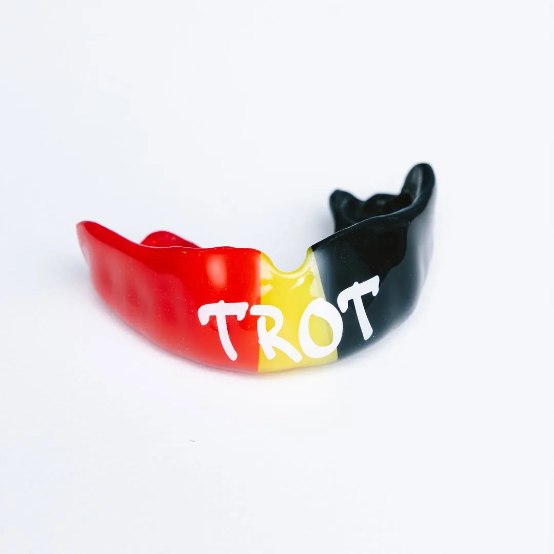 Red, yellow and black custom mouthguard with white Trot lettering.